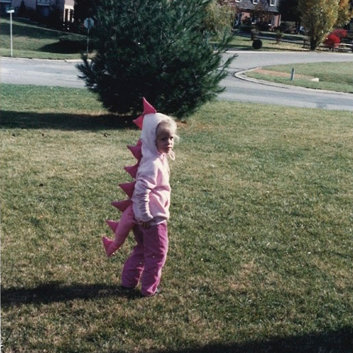 Young Jillian on Halloween as a dinosaur